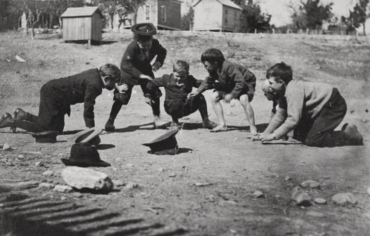 Children playing marbles. Image is courtesy of Victoria Regional History Center, Victoria College/University of Houston-Victoria Library.